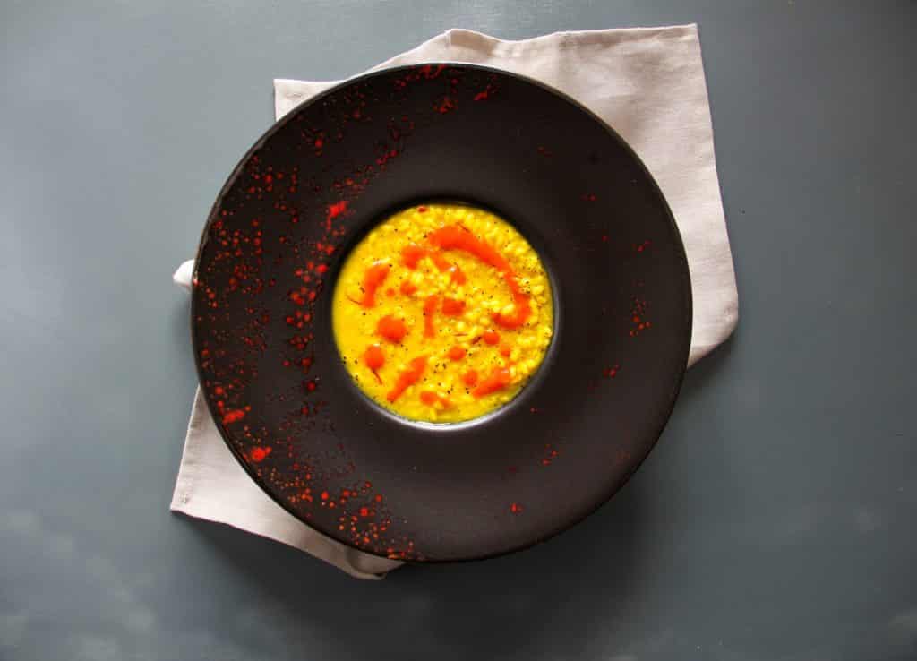 Risotto giallo zafferano, peperone rosso, liquirizia