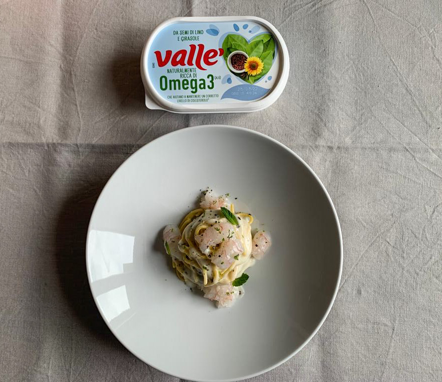 Tagliolini cacio e pepe con scampi e lime